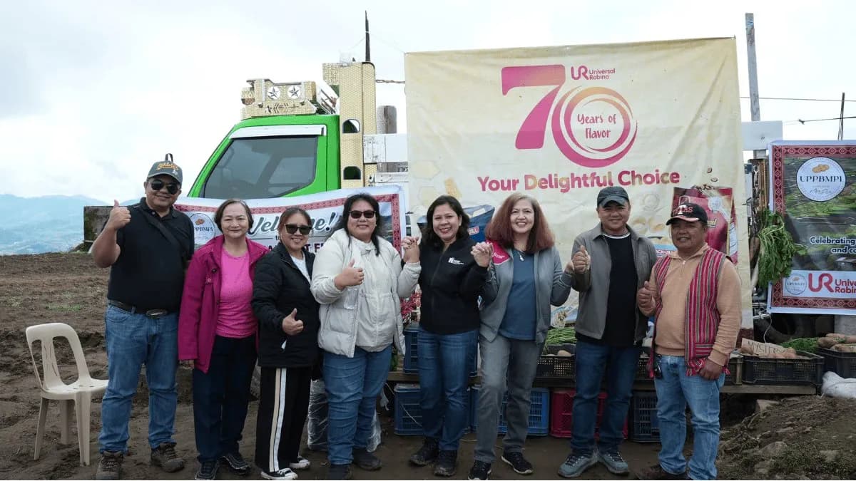 URC officials and Benguet potato farmers posing together at a harvest celebration